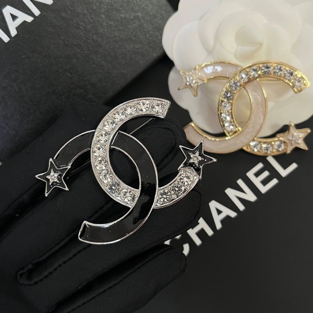 Chanel CC Brooch Silver and Black with Two Small Stars
