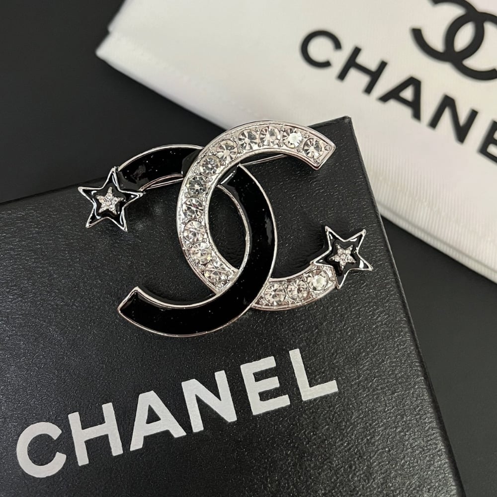 Chanel CC Brooch Silver and Black with Two Small Stars