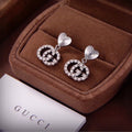 Gucci GG Heart Earrings in Silver with Crystals