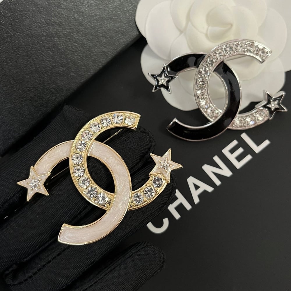 Chanel CC Brooch Silver and Black with Two Small Stars