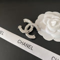 Chanel CC Brooch Silver with Stones and Two Stars