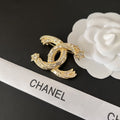 Chanel CC Brooch Gold with Stones and Two Stars