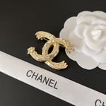 Chanel CC Brooch Gold with Stones and Two Stars
