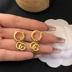 Gucci GG Running Drop Earrings in Gold