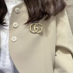 Gucci GG Brooch in Gold
