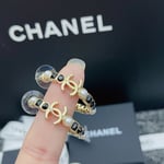 Chanel Gold & Black Metal Hoop Earrings