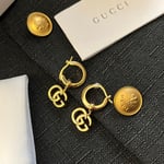 Gucci GG Running Drop Earrings in Gold